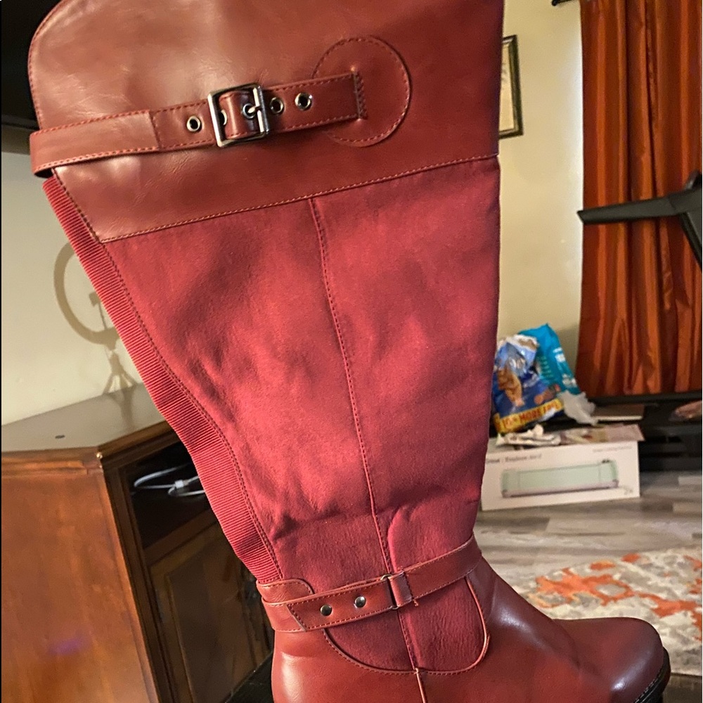 strawberry color boots wide calf fits more like 11. warn once
